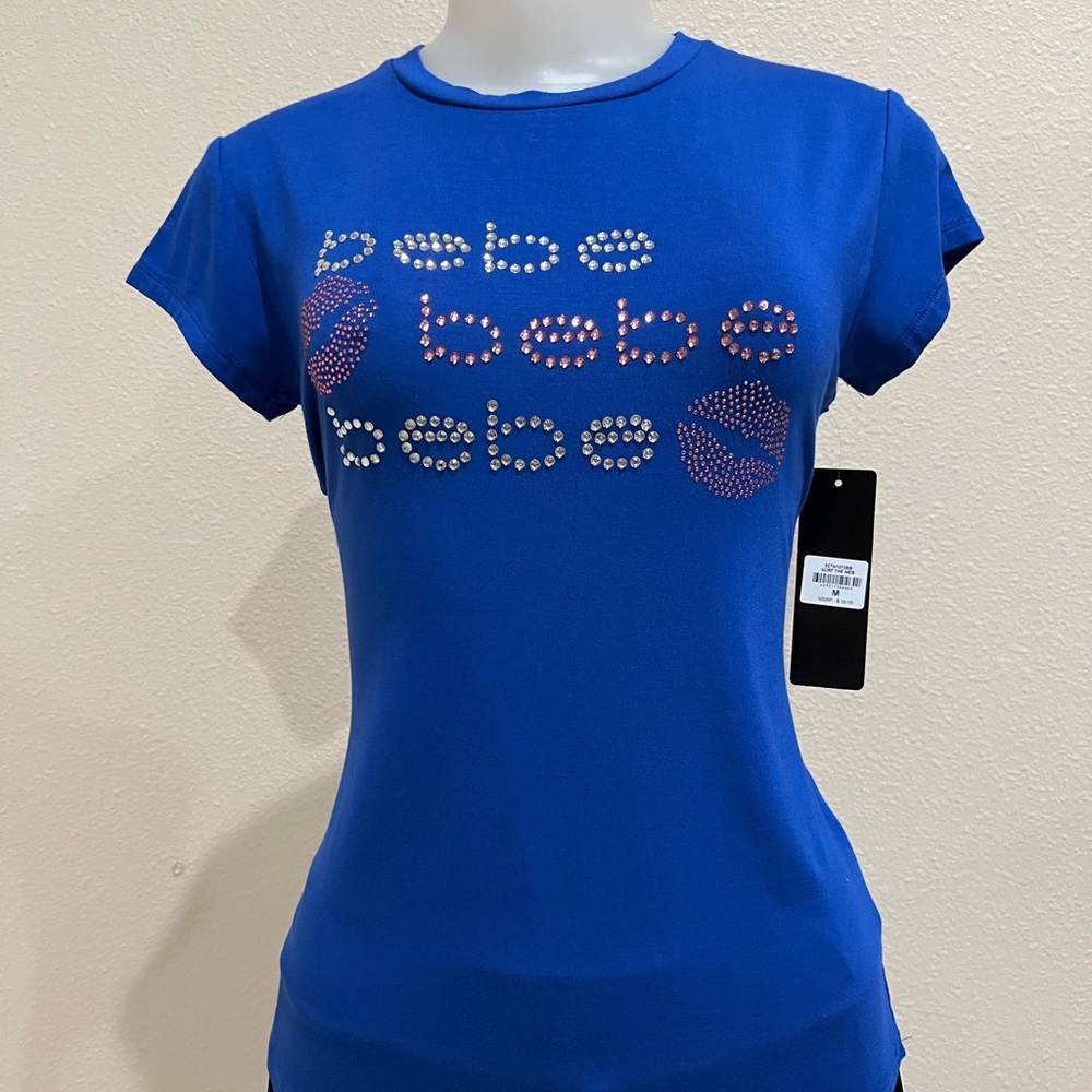 BEBE Women’s Top Blue with Silver and Pink Logo print. New. Medium